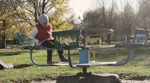 Turns on the carousel in the yard Stock-Footage 32109308