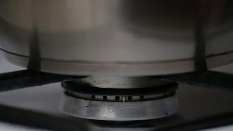 Turns off the gas under the pots. Close up Stock Footage 75832458