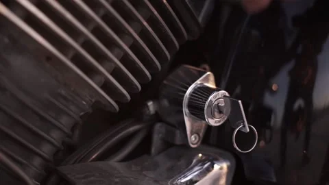 Turns the key on the motorcycle Video stock 233966138