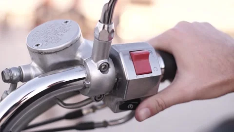 Turns the key on the motorcycle Video stock 233966187