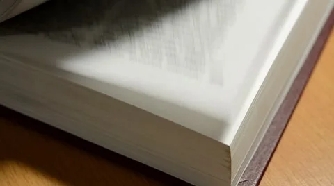Turns the pages of the book, close up Stock Footage 45820071