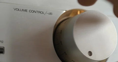 Turns the rotary volume control switch to add the sound. Stock Footage 108013857