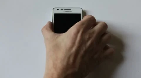 Turns on the Samsung i9100 Galaxy S II and start contacts Stock Footage