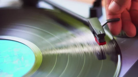 Turntable, Man using vinyl record system with manually. 4K Stock Footage 104847193