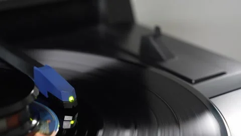 Turntable Needle Playing Vinyl Record in Close-Up Stock Footage 333757456