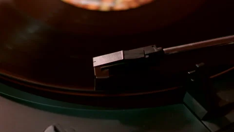 Turntable Needle Spinning Over Black Vinyl Stock Footage 219439158