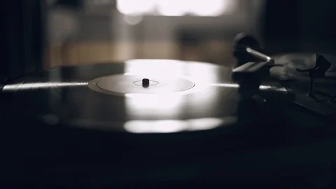 Turntable needle on a vinyl record. Vintage classic vinyl player. Stock Footage
