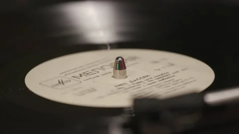 On the turntable is an old vinyl record playing Stock Footage 143715008