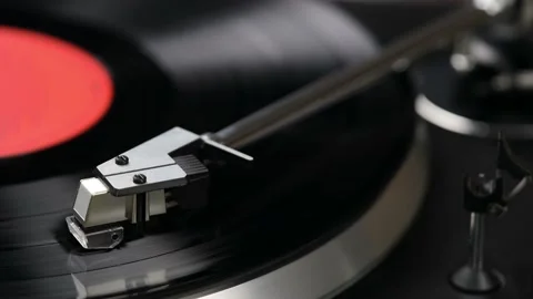 Turntable player with black vinyl record, stylus and turntable. Macro shot Stock Footage 219790258