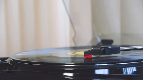 Turntable playing a vinyl record Stock Footage 107705562