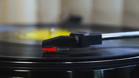 Turntable playing a vinyl record Stock Footage 107705601