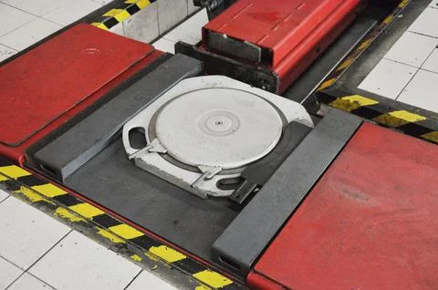 Turntable tool for car wheel alignment Stock Photos