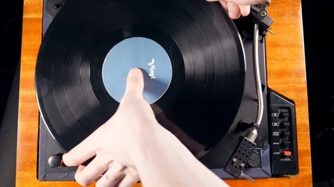 Turntable with a vinyl disc is getting launched Stock Footage 107946885