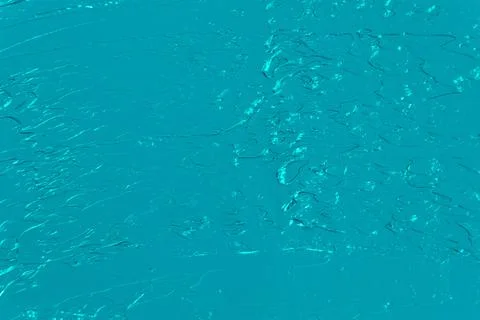 Turquoise abstract background, applied toning primer on a white surface Stock Photos