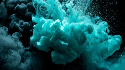 Turquoise and black paints splashes in water isolated on gray Stock Footage 296740433