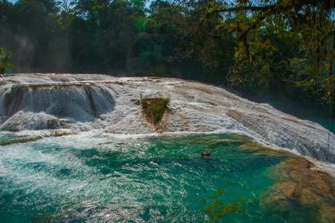 Turquoise-blue water of the waterfall Agua Azul in Chiapas, Palenque, Mexico. Stock Photos
