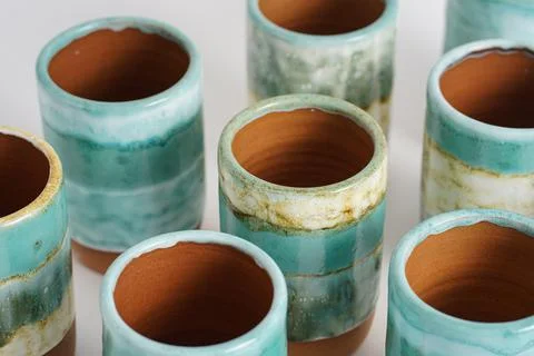 Turquoise ceramic mugs background Stock Photos