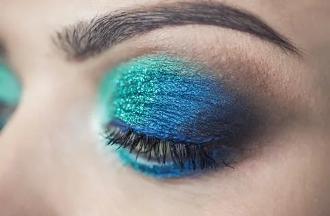 Turquoise close-up eye makeup Stock Photos