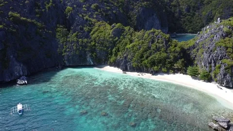 Turquoise Cove and Limestone Cliffs in El Nido, Palawan, Philippines Stock Footage 344477730