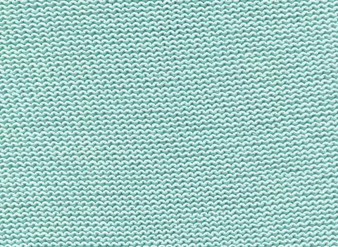 Turquoise fabric background with empty space for text. Warm turquoise mint  f Stock Photos