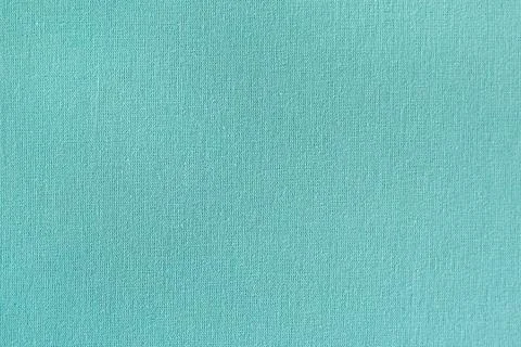 Turquoise fabric texture with subtle thread detail in a soft material finish 스톡 사진