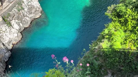 Turquoise Hidden Cove with Rocky Cliffs on Amalfi Coast Italy Summer Video stock 338033666