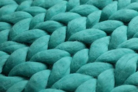 Turquoise knitted wool texture as background, closeup Stock Photos