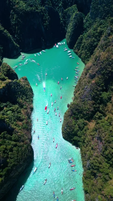Turquoise Lagoon Phi Phi Lee Island Boats Glide Through Paradise Thailand Video stock 346989452