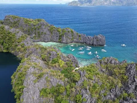 Turquoise lagoons and dramatic limestone cliffs in El Nido, Palawan Stock Photos