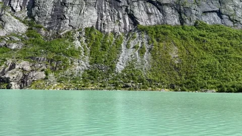 Turquoise lake among the rocks Stock Footage 337364582