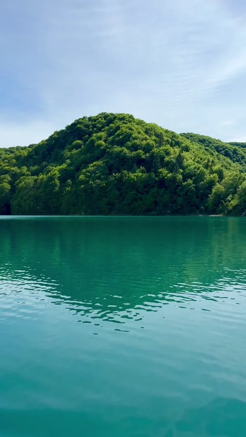 Turquoise Lake Surrounded by Forest at Plitvice Lakes Croatia Stock Footage 335965187
