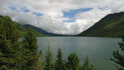 Turquoise lakes with a small waterfall between them, among the Altai Mountains Stock Footage 108028947