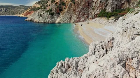 Turquoise Mediterranean sea washes pristine sand of Kaputas Beach Turkey Stock Footage 341750178