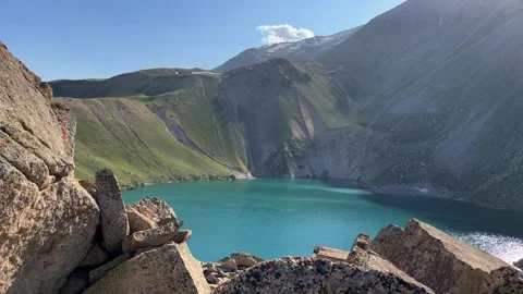 Turquoise mountain lake on the high plateau of Angren.  Stock Footage 252245093