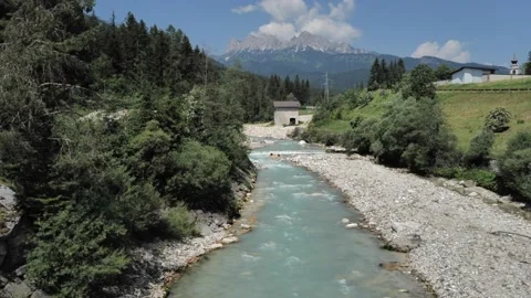 Turquoise mountain river in the Dolomite mountains Stock Footage 204719965