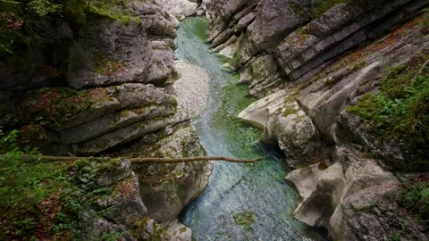 Turquoise mountain river stream flowing through scenic Rettenbach gorge and Stock Footage 345557825