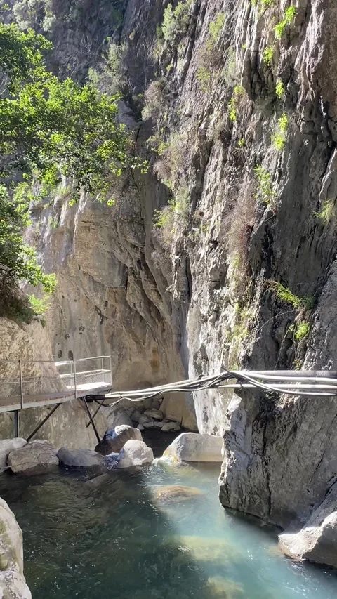 Turquoise Mountain River: Suspended Bridge Amidst Alanya's Canyon Stock Footage 272223704