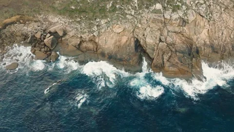 Turquoise Ocean And Cliffs Of Cabo de San Adrian - aerial shot Stock Footage 243008836