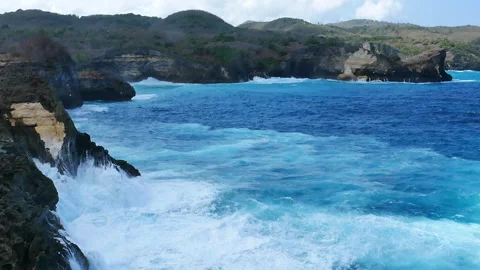 Turquoise ocean sea water white wave splashing deep blue sea Stock Footage 312661663