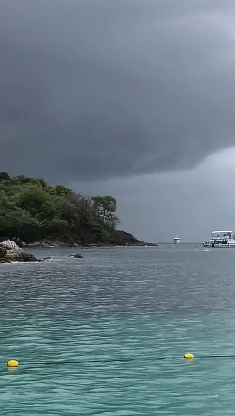 Turquoise Ocean Water Under Dark Storm Clouds Near Tropical Island Stock Footage 342062267