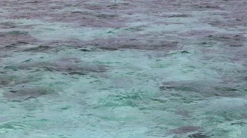 Turquoise ocean waves close up seamless loop Stock Footage 216739111