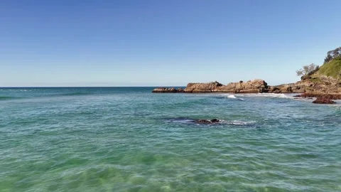 Turquoise Ocean Waves Rolling Toward Rocky Coastline in South West Rocks Stock Footage 340883984