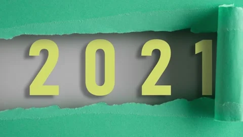 Turquoise paper is torn over 2021 on white background, stop motion, animation Stock Footage 145490065