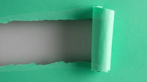 Turquoise paper is torn over white background for message, stop motion. Stock Footage 145358880