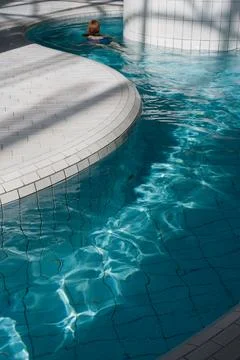 Turquoise Pool with Sunlight Reflections. Stock Photos