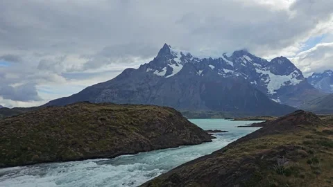 Turquoise Rapids below Snow-Capped Paine Peak, Salto Grande, Chile 8K Stock Footage 306493215