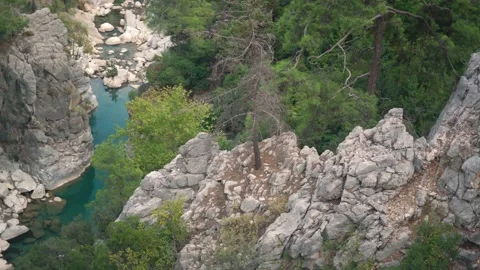 Turquoise river between rocky slopes of Chimaera mountain Stock Footage 143327338