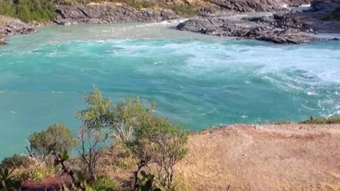 Turquoise River Glides Through Scenic Patagonia in Autumn Stock Footage 327014786