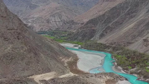 Turquoise River Winding Through Rugged Mountain Gorge Stock-Footage 334136255