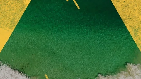 Turquoise sea through yellow triangular shape foreground Stock Footage 123774487